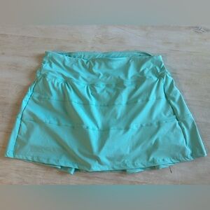 Aqua colored tennis/ pickleball skirt. Size XL